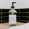 Sweet Water Decor Clear Glass White Script Label Hand Soap Dispenser - 16oz