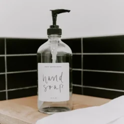 Sweet Water Decor Clear Glass White Script Label Hand Soap Dispenser - 16oz